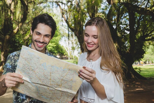 Smiling couple with map