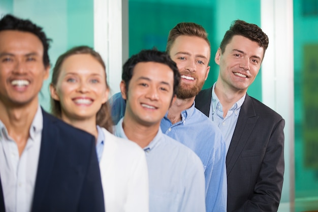 Smiling Diverse Business People Standing in Row