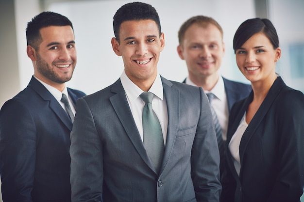 Free Photo | Smiling executives waiting for the meeting