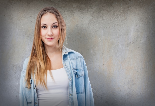 Smiling girl wearing denim jacket