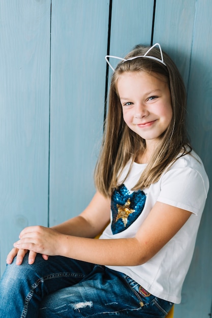 Smiling girl with cat ears