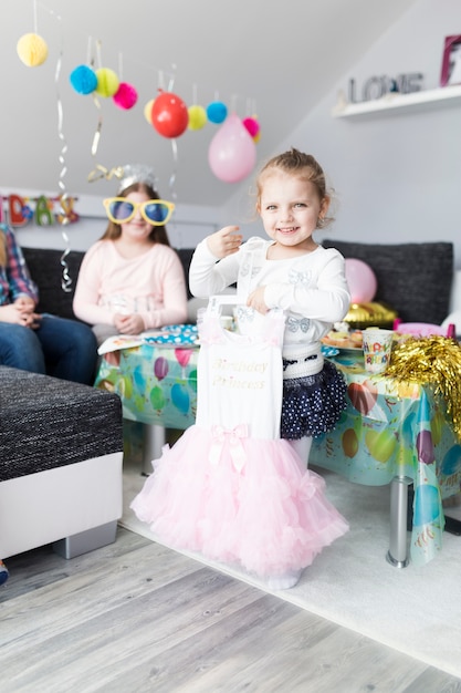 Smiling girl with cute dress