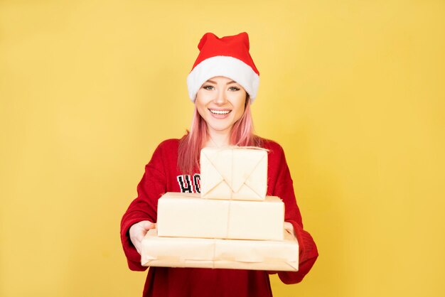 Smiling girl with red santa suit 2