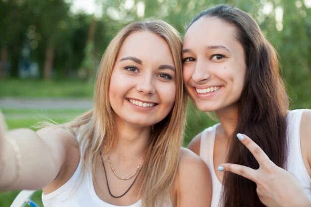 Smiling girls posing