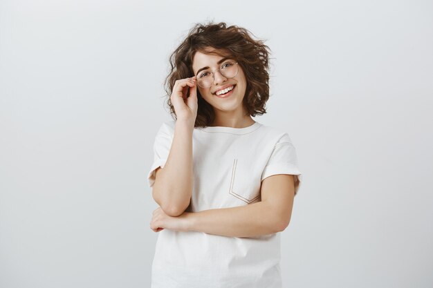 Smiling happy successful female cross arms and looking confident