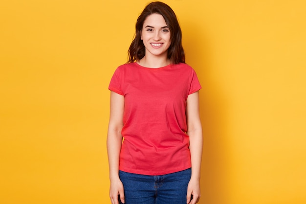 Smiling joyfull female with dark hair