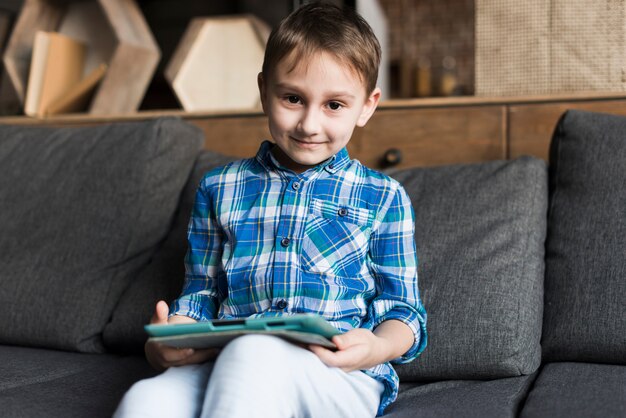 Smiling kid on couch