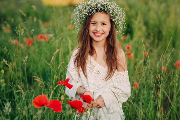 Smiling kid wearing a wreath