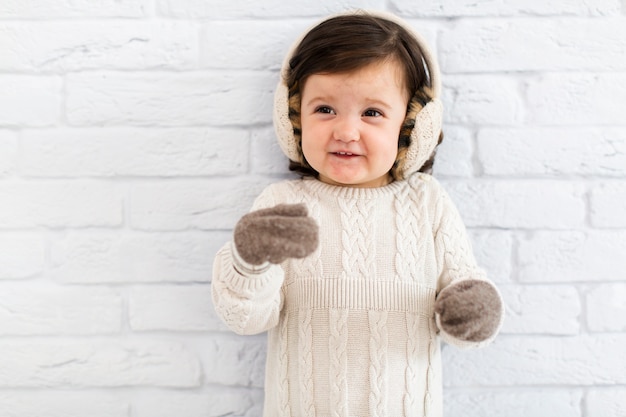 Smiling little girl winter dressed