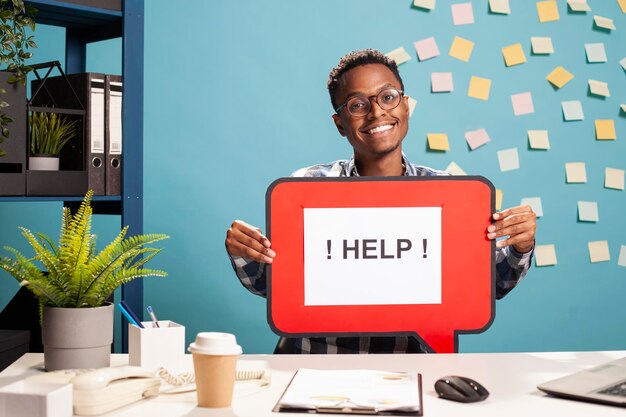 Smiling man advertising call for help