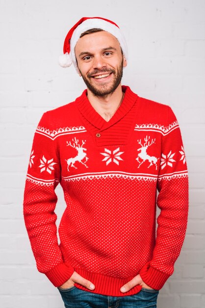 Smiling man in party hat