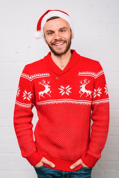 Smiling man in party hat