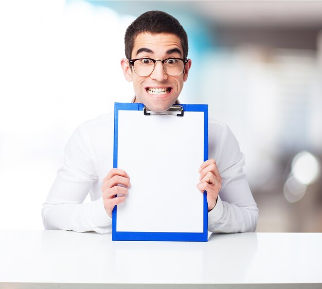 Smiling man with a check table