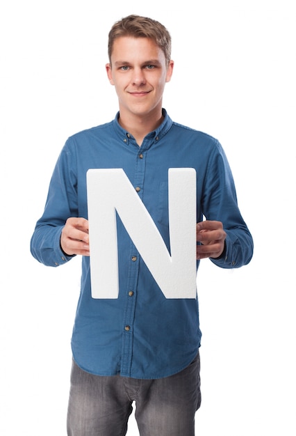 Free photo smiling man with the letter 