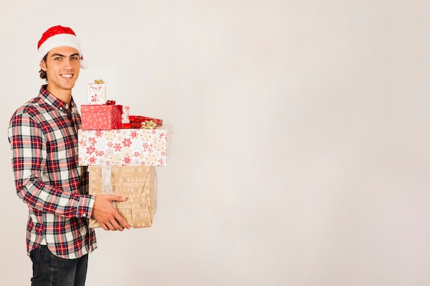 Smiling man with presents