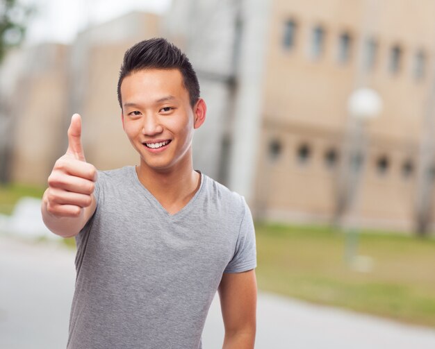 Smiling man with thumb up