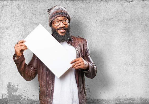 Free photo smiling man with a white poster