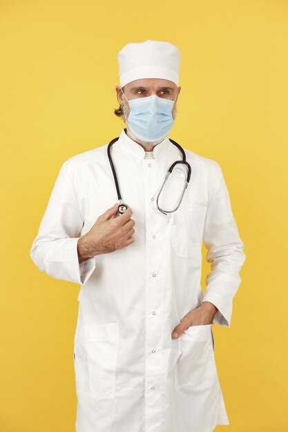 Smiling medical doctor with stethoscope. Isolated. Coronavirus concept