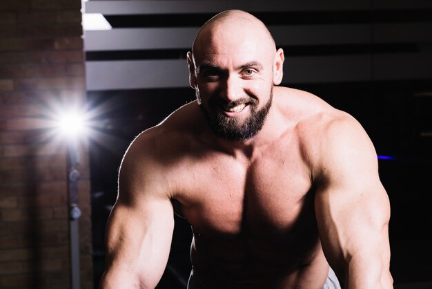 Smiling muscular man