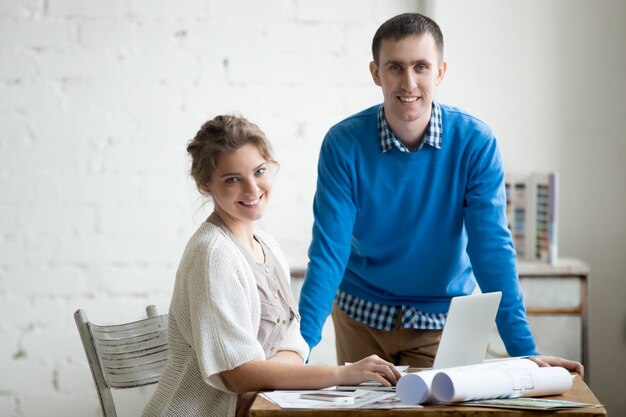 Smiling office employees