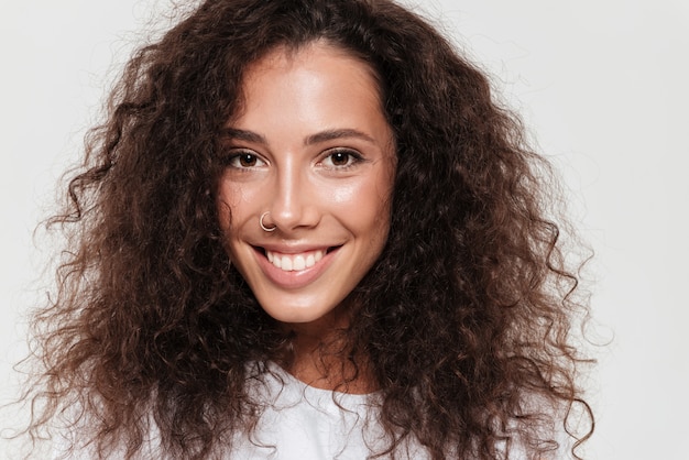 Smiling pretty curly woman