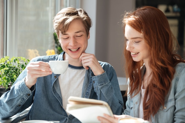 Smiling students doing homework