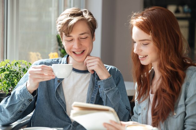 Smiling students doing homework