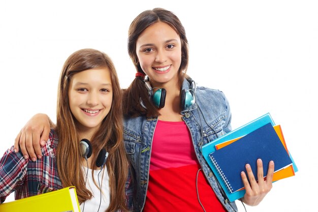 Smiling teenagers with headphones