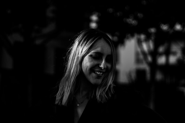 Smiling woman in black and white