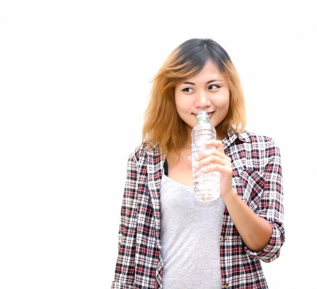 Smiling woman holding a bottle of water