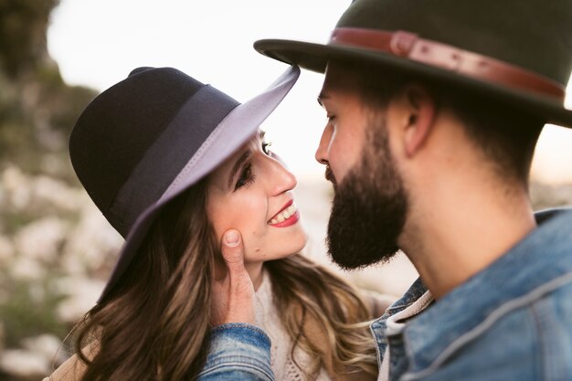 Smiling woman looking at her boyfriend