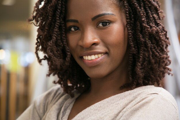 smiling woman posing at public library