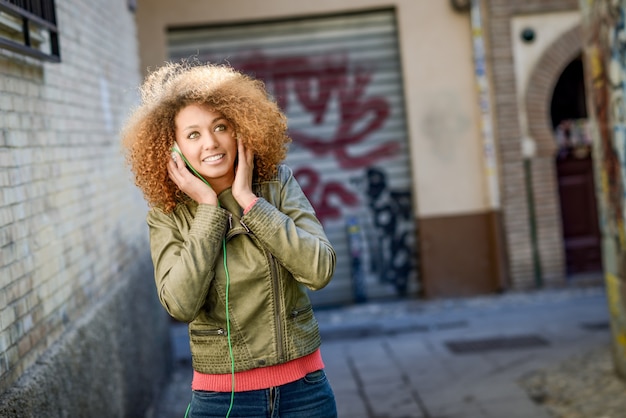 Smiling woman talking on her phone