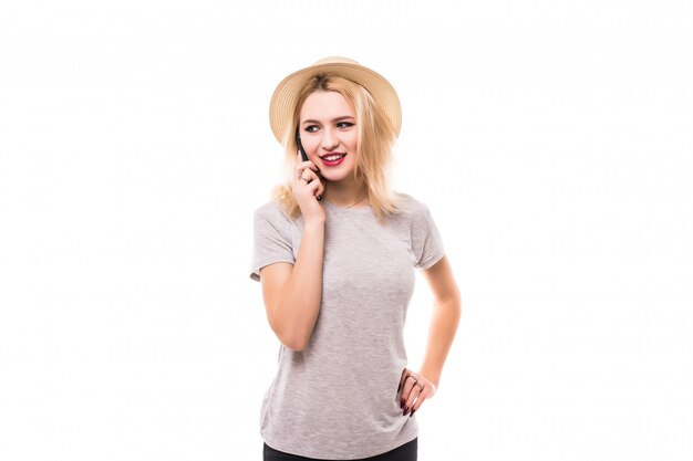 Smiling woman using a brand new mobile phone in black case