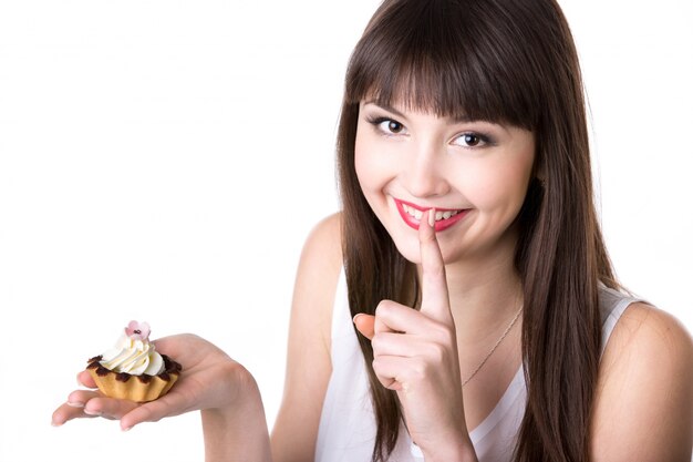 Smiling woman with a cake