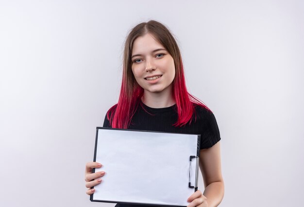 Smiling young beautiful girl wearing black t-shirt holding clipboard on isolated white background