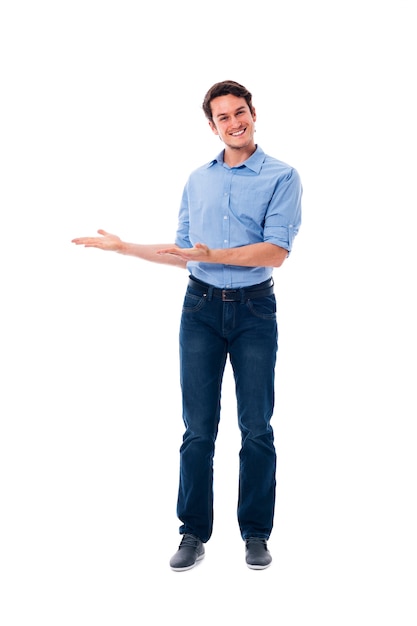 Smiling young man presenting something