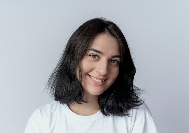 Smiling young pretty caucasian girl looking at camera isolated on white background