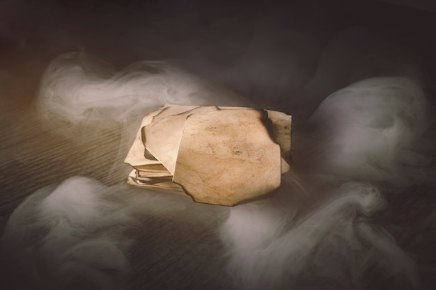 Free photo smoke over burnt paper