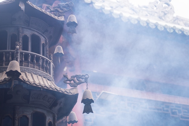 Free photo smoke in the temple tower