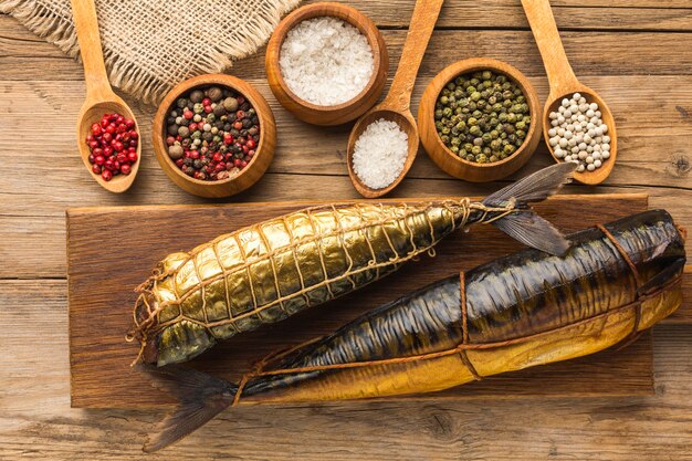 Smoked fishes and spices arrangement