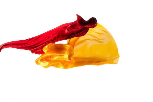 Smooth elegant transparent yellow, red, cloth separated on white