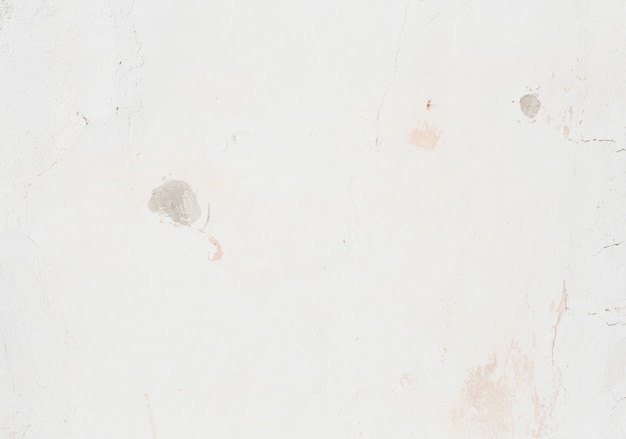 Free photo smooth stained white plaster surface