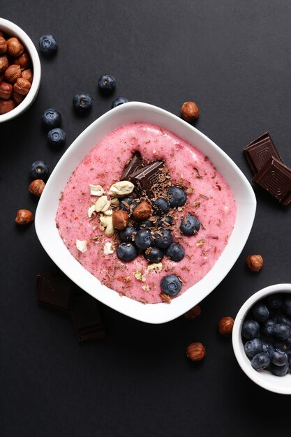 Smoothie bowl with chocolate and berries