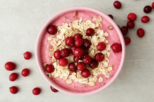 Smoothie bowl with oat and cranberries