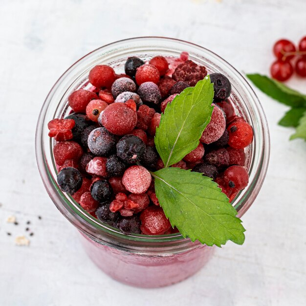 Smoothie with frozen fruits high angle