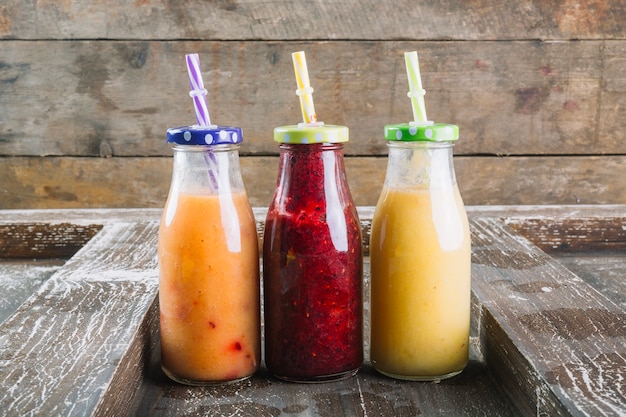 Smoothie on wooden background