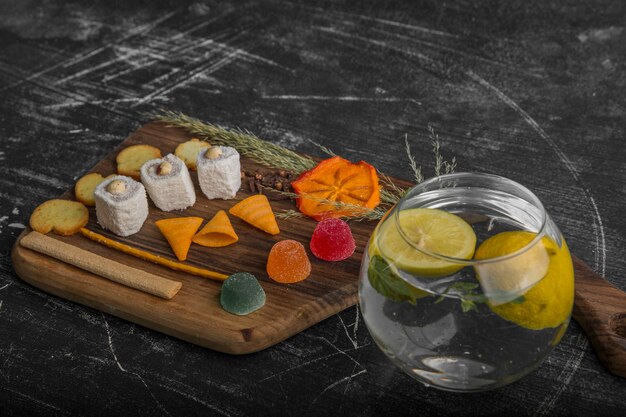 Snack and pastry board with potatoes in the water