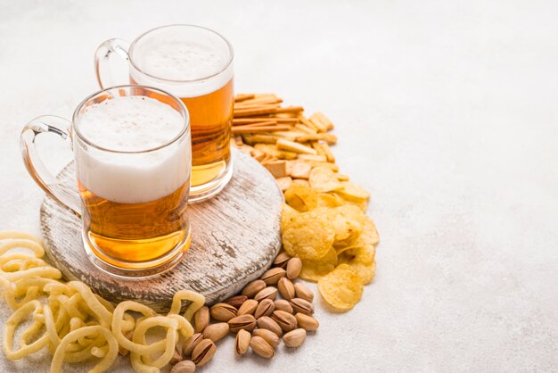 Snacks and beer arrangement high angle