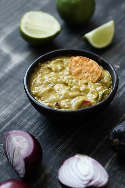 Snacks. Nacho with guacamole sauce on the table